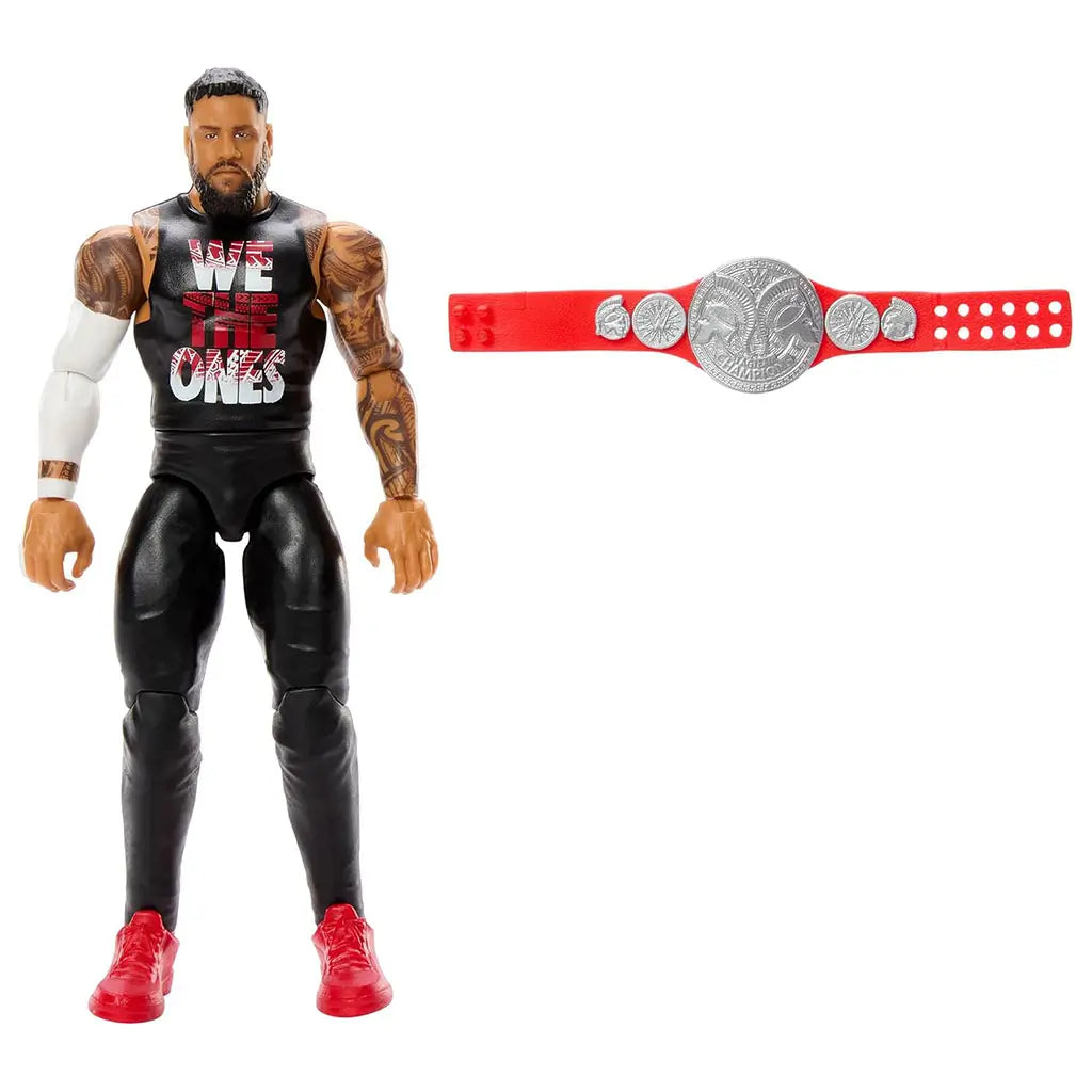 WWE Jey Uso action figure stands beside a silver-and-red championship belt, displaying articulated black pants, red shoes, muscle definition, and tattooed arms on a plain white background.