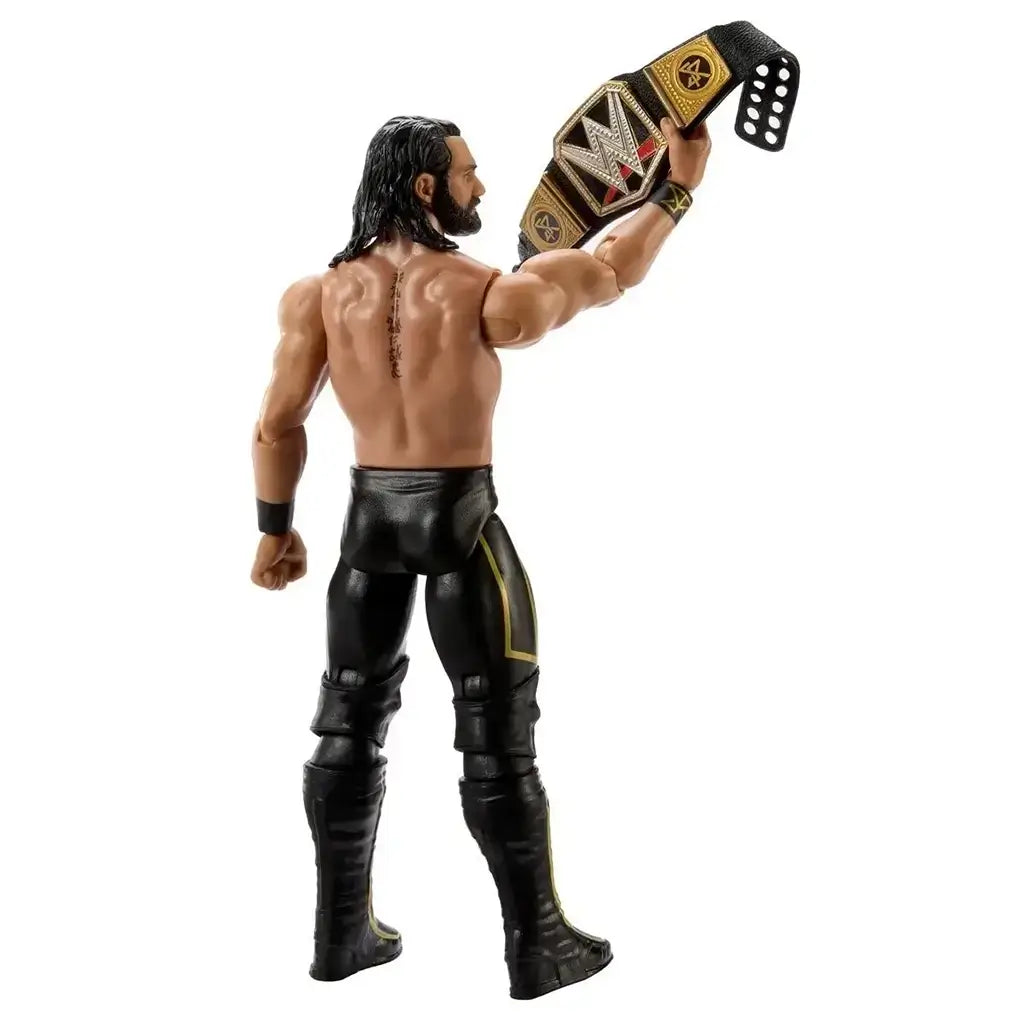 WWE Seth Rollins action figure is viewed from behind holding a detailed championship belt aloft, revealing sculpted back muscles, black-and-gold tights, and articulated boots on a white studio background.