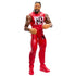 WWE Main Event Series Jimmy Uso wrestling figure posed dynamically to demonstrate articulation, wearing red gear with tattooed arms on a white studio background.