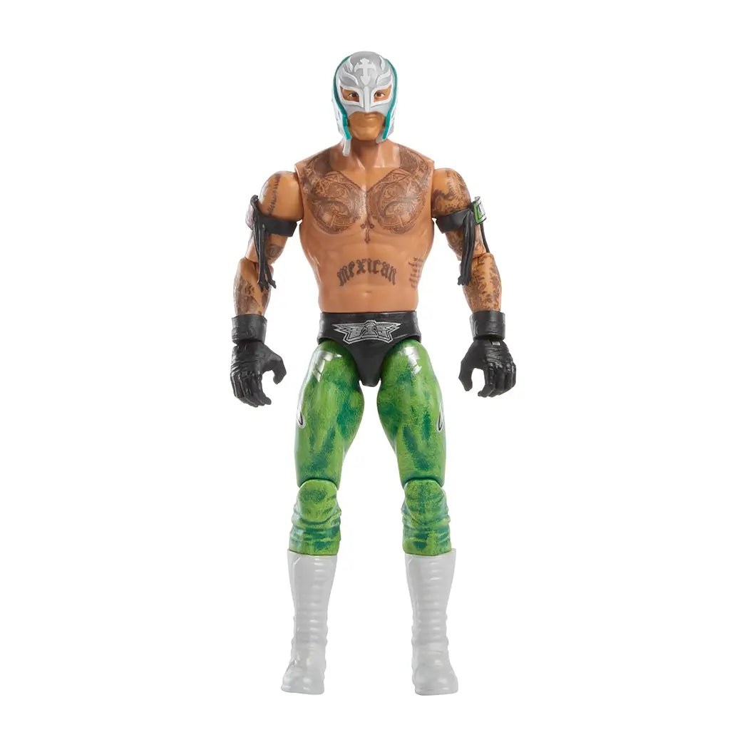 WWE Rey Mysterio action figure featuring tan plastic skin tone, silver and teal lucha mask, tattooed chest and arms, green patterned tights, black gloves, and white boots, designed as a 6-inch poseable wrestling figure on white.
