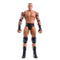 WWE Randy Orton action figure featuring tan plastic skin tone, muscular sculpted torso, close-cropped hair, full tattooed arms, black trunks, knee pads, wrist tape, and black lace-up boots, designed as a 6-inch poseable wrestling figure on white.