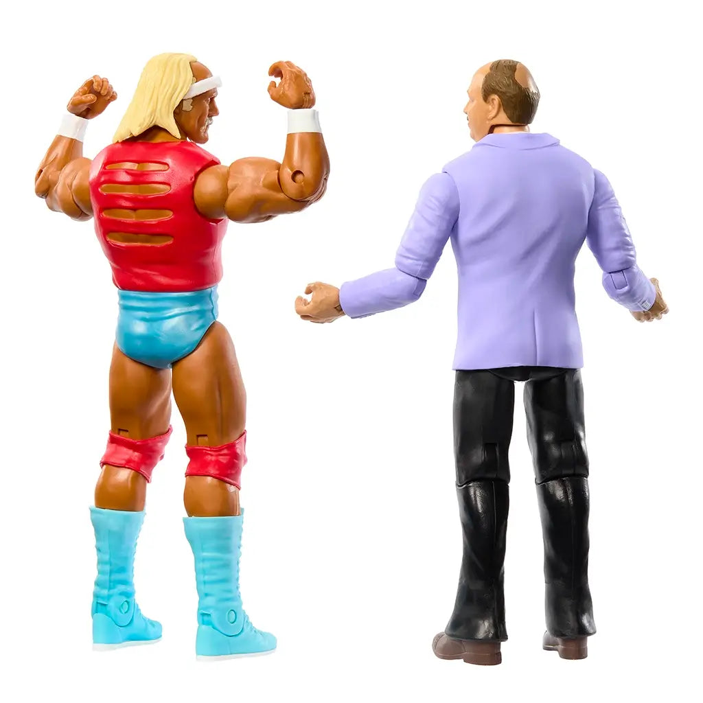 Rear angled view of WWE action figures shows Hulk Hogan flexing in red and turquoise gear with blonde hair and headband, standing next to Mean Gene Okerlund in purple jacket.