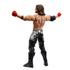 Rear angled view of WWE AJ Styles action figure showing sculpted back muscles, long hair, and detailed designs on black pants with silver graphics.