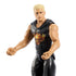 Close-up of WWE Cody Rhodes action figure in black attire with flaming skull chest design, showing muscular arms, blond hair, and detailed facial sculpt against white background.