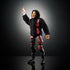 WWE Solo Sikoa action figure angled pose wearing black hoodie with red "SOLO" lettering, black shorts with red design, and black boots, raising one arm upward in dramatic stance.