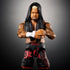 WWE Solo Sikoa action figure close-up with detailed tattoos, black hooded vest, black shorts with red graphics, and white wrist tape against a dark gradient background.