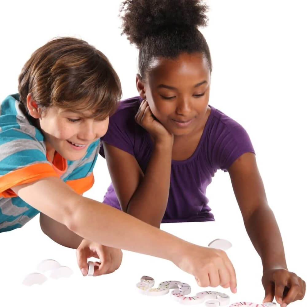 Children playing with bendomino game together.