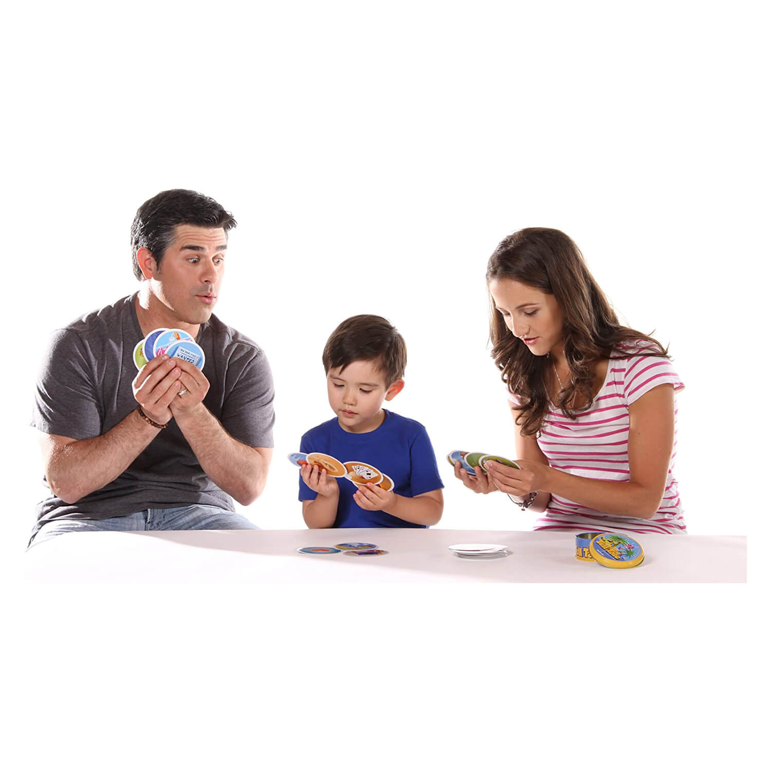 Family honlding game cards together.