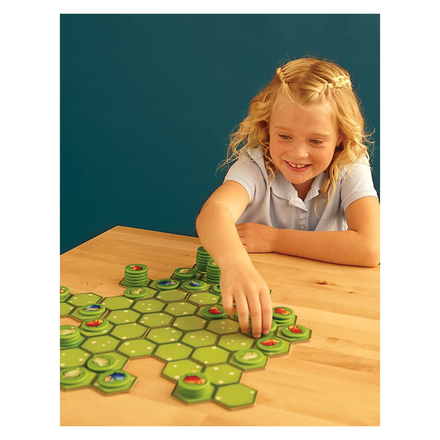 Girl playing Blue Orange Battle Sheep Game.