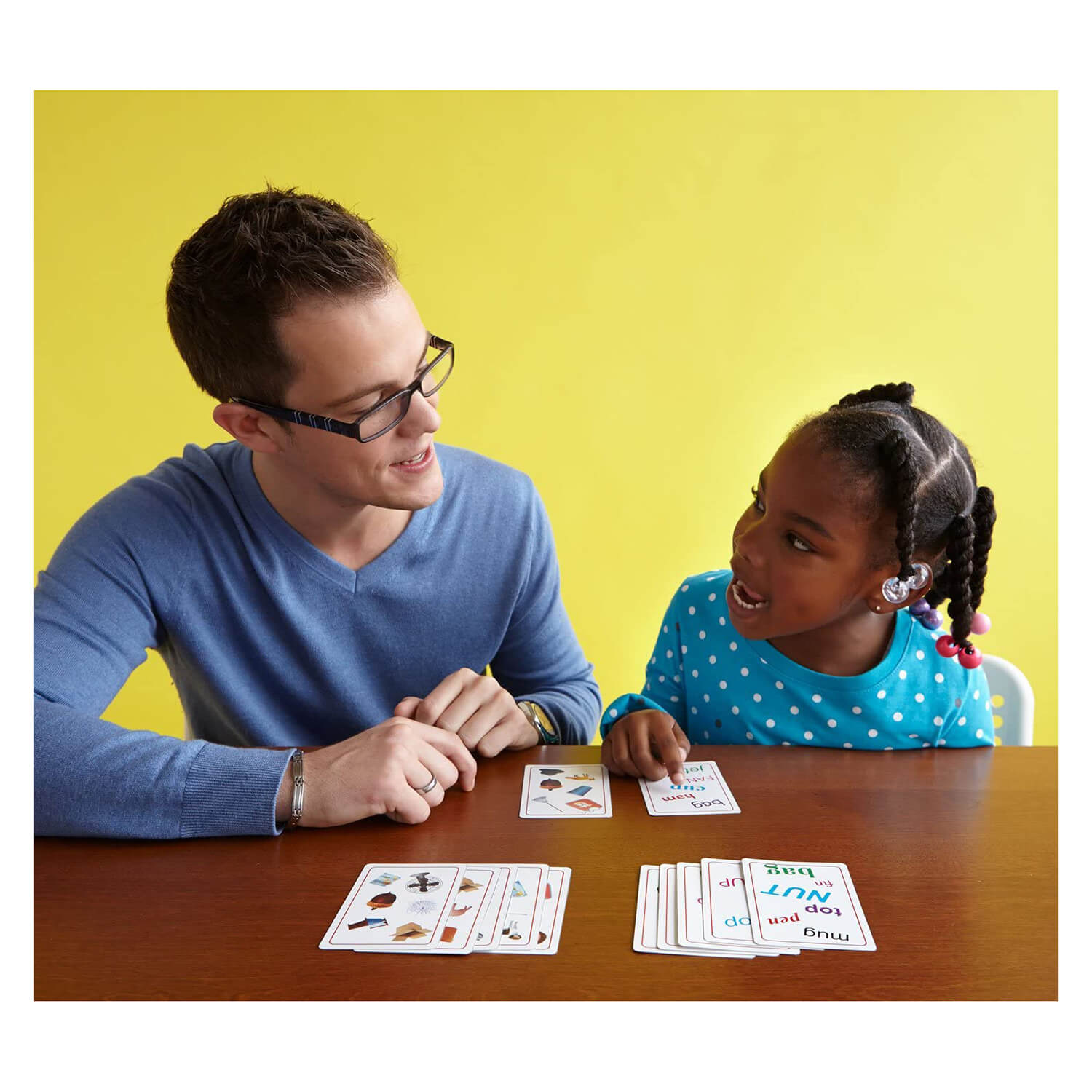 People playing the card game.