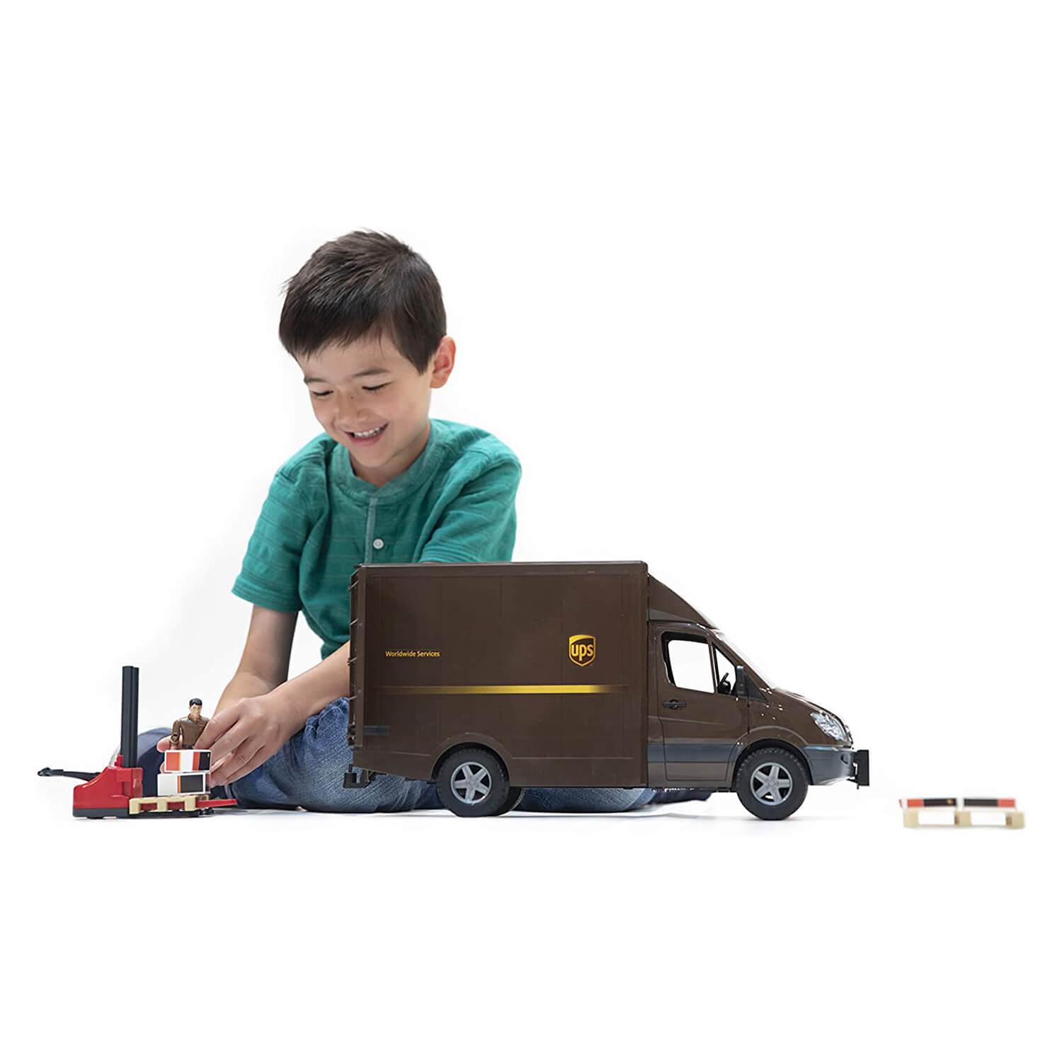 Kid playing with the mercedes-benz toy.
