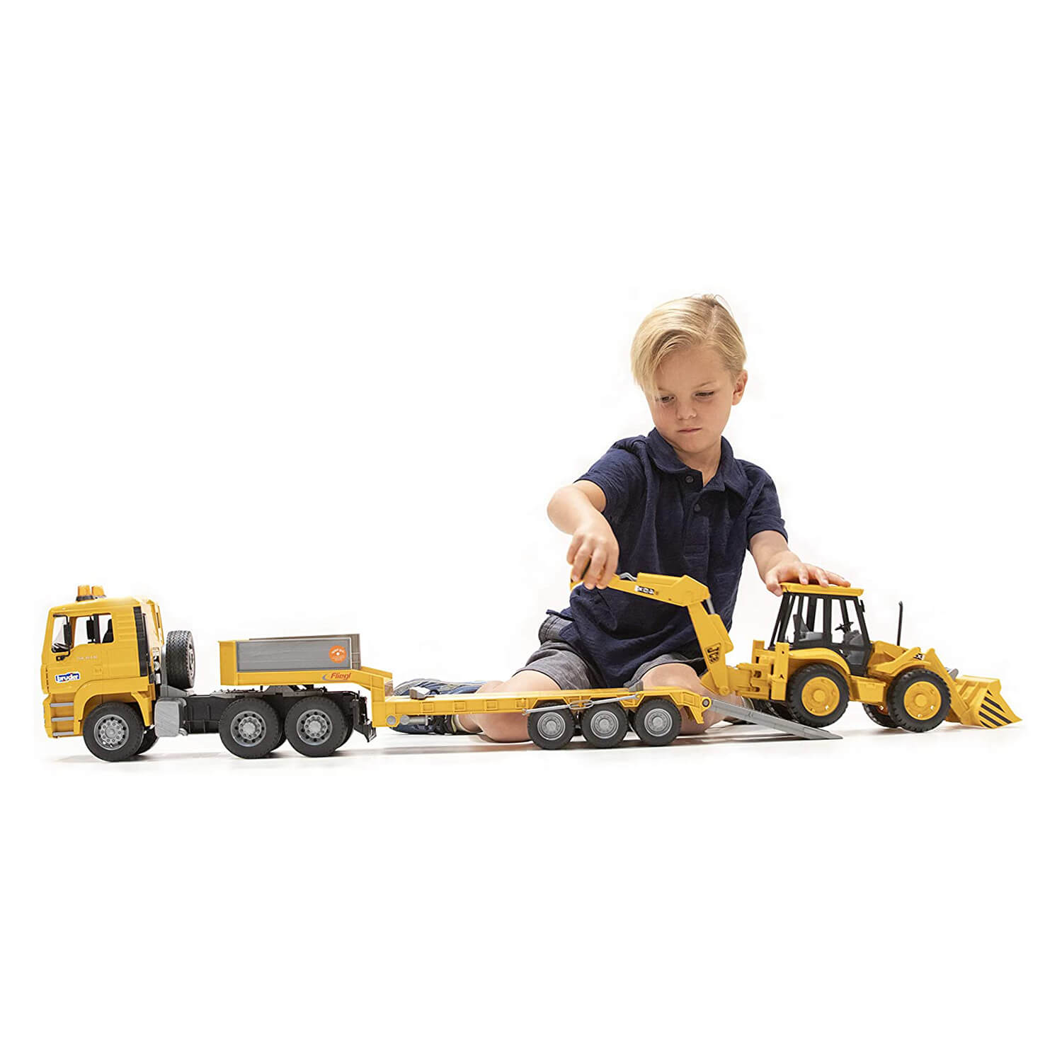 Kid playing with the loader truck toy.