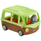 Toy adventure bus playset with bright green plastic roof, smooth brown body, rounded open seating, and small gray owl figure beside it, shown in a clean studio setting for children’s product display.