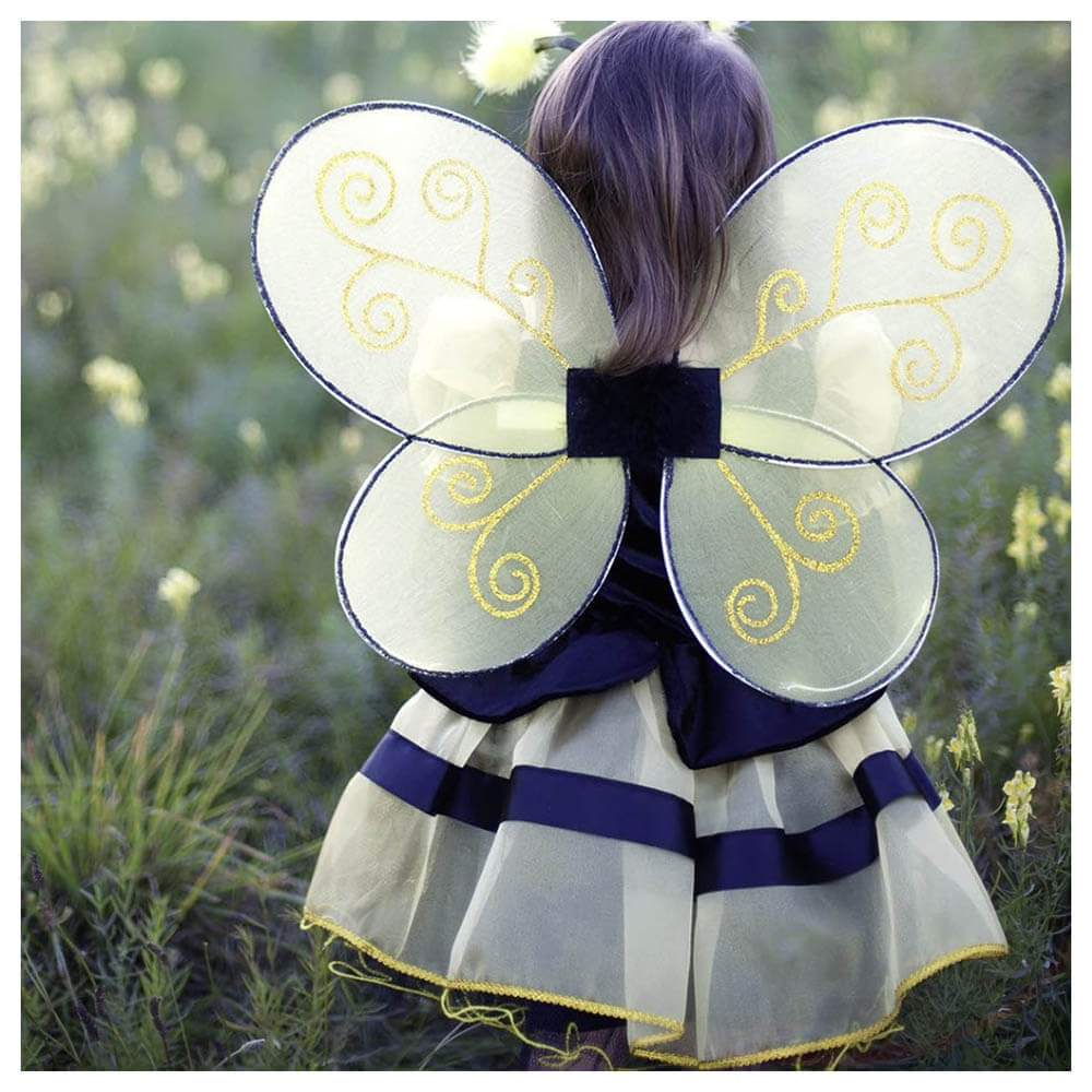 Back view of little girl wearing the Great Pretenders Bumble Bee Wings & Headband costume.