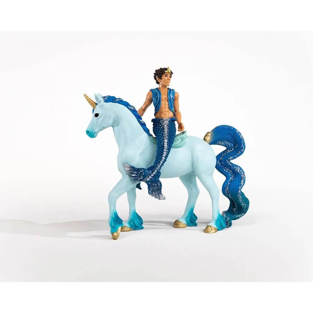 Side view of Aryon sitting on the blue unicorn.
