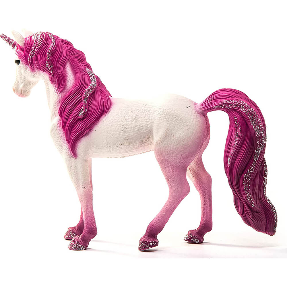 Schleich Bayala Mandala Unicorn Mare toy in white textured plastic with pink legs, a sparkling horn and flowing magenta mane and tail, shown from the left side against a plain white background.