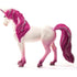 Schleich Bayala Mandala Unicorn Mare toy in white textured plastic with pink legs, a sparkling horn and flowing magenta mane and tail, shown from the left side against a plain white background.