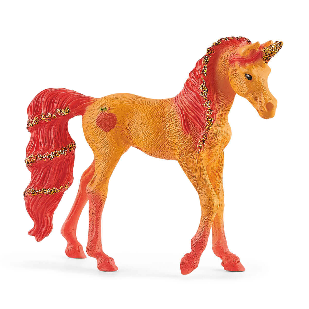 Schleich Bayala Peach unicorn figure in orange textured plastic, with a red mane and tail edged in gold glitter, a sparkling horn and red apple flank marking, standing on a white background.