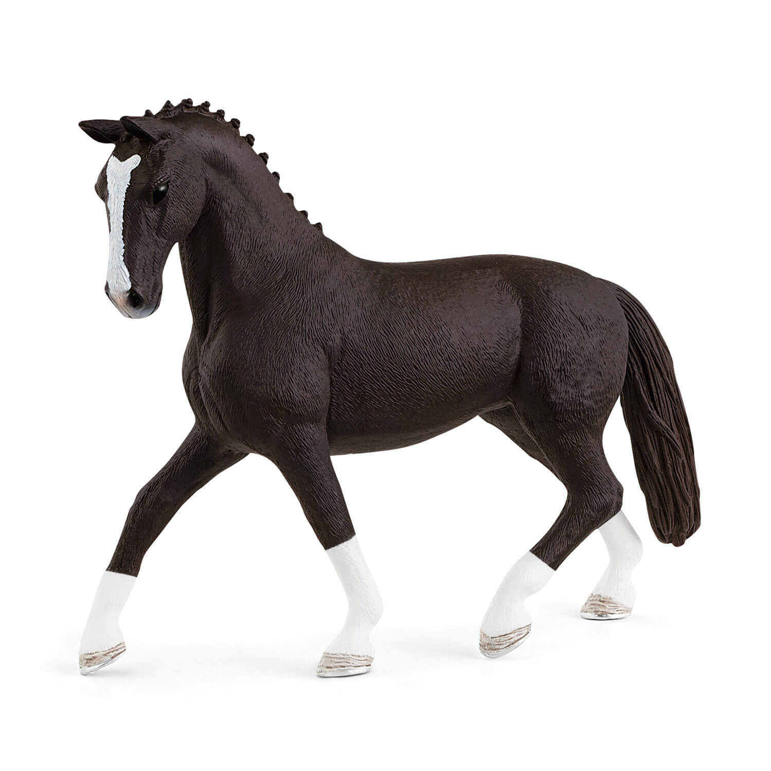 Schleich Horse Club Black Hannoverian Mare horse figurine in dark brown textured plastic, with a braided mane, white facial blaze and four white socks, posed trotting against a plain white background.